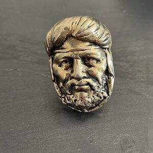 Unsigned Joseff of Hollywood famous turban man single gold tone cufflink